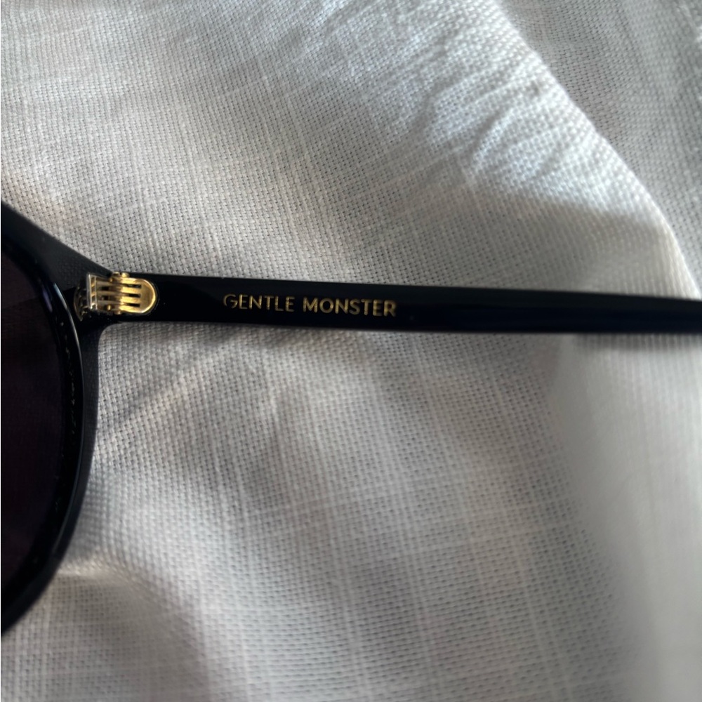 Gentle Monster Black Sunglasses with Gold Accents - Picture 7 of 9